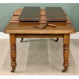 VICTORIAN MAHOGANY ROUNDED END WIND-OUT DINING TABLE - on turned supports and brown pot castors,