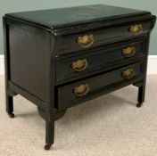 CHEST OF DRAWERS - 20th Century ebonized, three drawer example with swing brass handles, on castors,