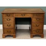 REPRODUCTION MAHOGANY KNEEHOLE DESK - having twin banks of four drawers on corner bracket feet