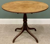 REGENCY MAHOGANY TILT TOP TABLE - the 88cms oval top on a turned column and four splayed supports,