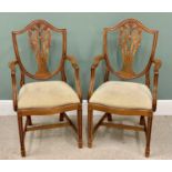 MAHOGANY SHIELDBACK ELBOW CHAIRS - A PAIR - with Prince of Wales style carvings to the splat backs,