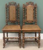 HIGH BACK OAK HALL CHAIRS - a pair, ornately carved with fruit and vine decoration, barley twist