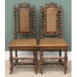 HIGH BACK OAK HALL CHAIRS - a pair, ornately carved with fruit and vine decoration, barley twist