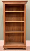 ANTIQUE STYLE MAHOGANY BOOKCASE - with adjustable interior shelving, having carved and fluted detail
