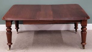VICTORIAN MAHOGANY WIND-OUT TABLE - on turned and reeded supports, with additional leaf and