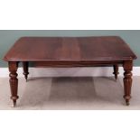 VICTORIAN MAHOGANY WIND-OUT TABLE - on turned and reeded supports, with additional leaf and