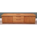 MID-CENTURY TEAK SIDEBOARD - with four cupboard doors flanking two central drawers, 56cms H,