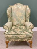 VINTAGE WALNUT SATIN UPHOLSTERED WINGBACK ARMCHAIR - foldover type arms and carved knee front