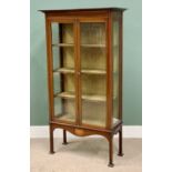 CIRCA 1900 MAHOGANY STRING INLAID TWO DOOR GLAZED DISPLAY CABINET - having three fabric covered