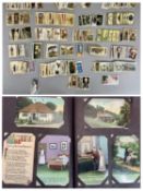 VINTAGE POSTCARD ALBUM and a mixed quantity of collector's cigarette cards, approximately 200