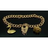 9CT GOLD HOLLOW LINK CHARM BRACELET with padlock clasp and two charms, links, padlock and water