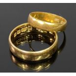 22CT GOLD WEDDING BANDS (2) - early 20th century date marks, Sizes H and M, 6.8grms gross