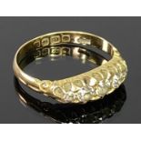 18CT GOLD FIVE STONE DIAMOND RING - inline claw set mounted row of round cut diamonds having a