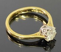 18CT GOLD SOLITAIRE DIAMOND RING - 0.50ct round, claw mounted to a coronet setting against raised