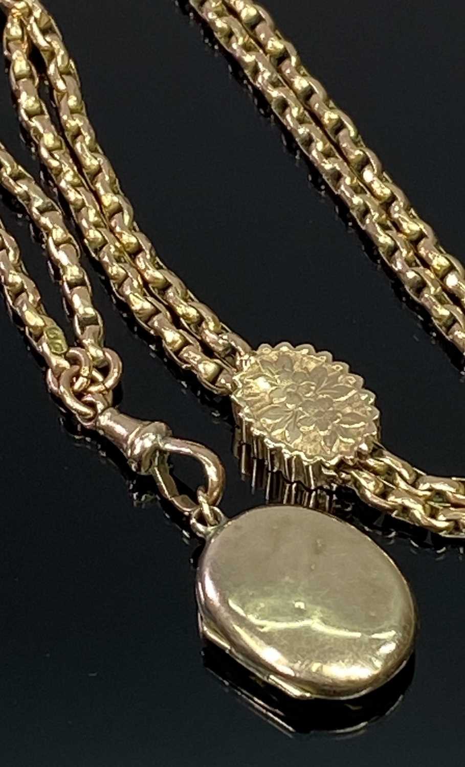 ANTIQUE 9CT GOLD FILED BELCHER LINK MUFF CHAIN - holding a small unmarked yellow metal locket, 75cms