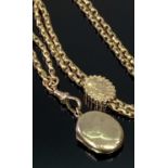 ANTIQUE 9CT GOLD FILED BELCHER LINK MUFF CHAIN - holding a small unmarked yellow metal locket, 75cms