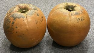 TERRACOTTA GARDEN ORNAMENTS, A PAIR - modelled as apples, 40cms H