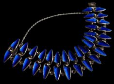 NORWEGIAN STERLING SILVER & ENAMEL BRACELET, the bracelet designed as two rows of teeth in deep blue