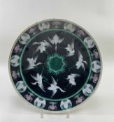 CHINESE FAMILLE NOIR 'CRANE & BAT' DISH, 6-character Qianlong mark, decorated with eight