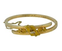 18K GOLD HINGED BANGLE, set with three seed pearls, marked for Finland, 11.7gms Provenance: deceased
