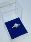 18K WHITE GOLD DIAMOND SOLITAIRE RING, the single round brilliant cut stone measuring 0.3ct approx.,