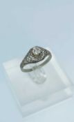 14K WHITE GOLD DIAMOND SOLITAIRE RING, the round brilliant cut stone measuring 0.33ct approx.,