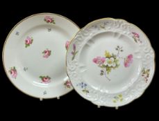 TWO SWANSEA PORCELAIN PLATES being a typically moulded example with flower decoration by Pollard,