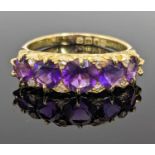 18CT YELLOW GOLD FIVE STONE AMETHYST & DIAMOND CHIP RING, ring size R, 5.0gms Provenance: deceased