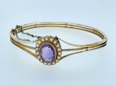 15CT GOLD AMETHYST & SEED PEARL HINGED BANGLE, 14.5gms Provenance: private collection Pembrokeshire,