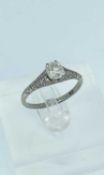 WHITE METAL DIAMOND SOLITAIRE RING, the single old European cut stone measuring 0.5ct approx.,