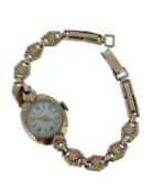 9CT GOLD LADIES ROTARY WRISTWATCH, having 9ct gold integrated bracelet, 13.8gms Provenance: