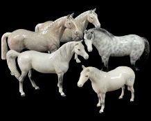 FOUR GREY BESWICK HORSES, along with an unstamped model of a grey horse, tallest 20.5cm H (5)