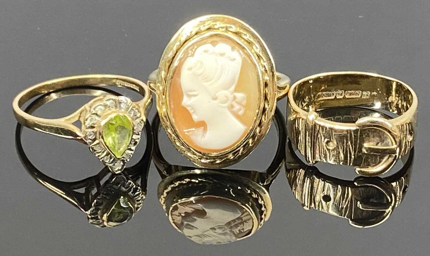 9CT GOLD DRESS RINGS (3) - one having a basket style mount set with a pear shape peridot