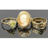 9CT GOLD DRESS RINGS (3) - one having a basket style mount set with a pear shape peridot