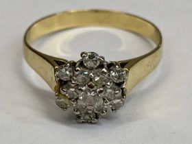 18CT GOLD DIAMOND CLUSTER RING - having claw set small stones in a coronet mount, Size T, 3.9grms,