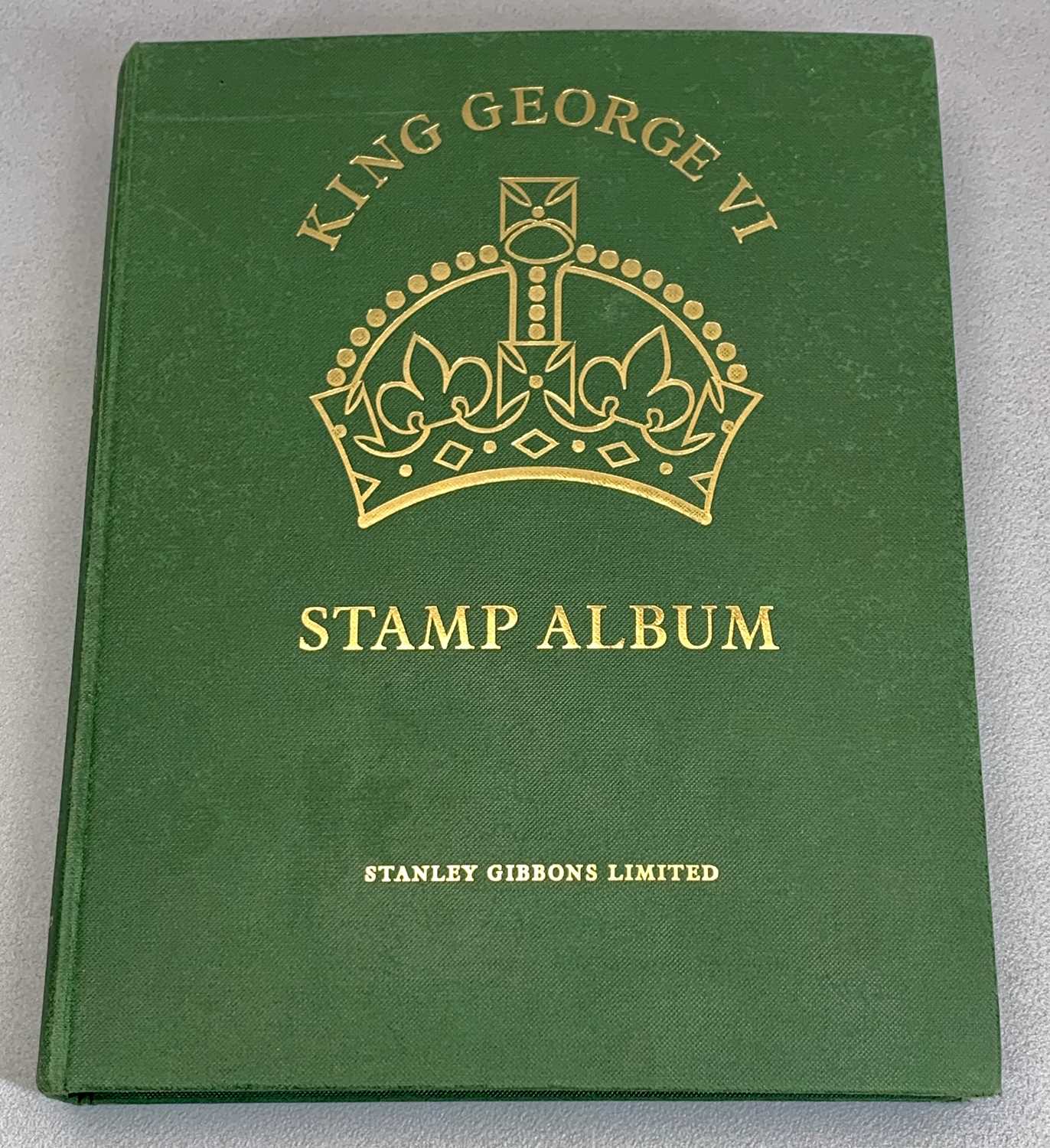 STAMPS - George VI Crown Album containing a well filled collection of mint stamps, many top values