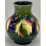 MOORCROFT 'LEAVES & BERRIES' VASE - of squat baluster form, 20cms H