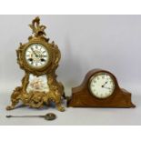 A FRENCH ROCOCO STYLE GILT PAINTED MANTEL CLOCK - late 19th century, circular porcelain dial hand