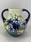 MOORCROFT VASE - of pear shape two handled form, tube lined in the 'Spring Flowers' pattern, on a