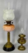OIL LAMPS (2) - late 19th century, with black ceramic base, fluted brass column, moulded pink opaque