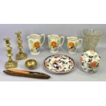 ARTHUR WOOD GRADUATED SET OF 3 OCTAGONAL JUGS - brightly coloured floral decoration, 18cms