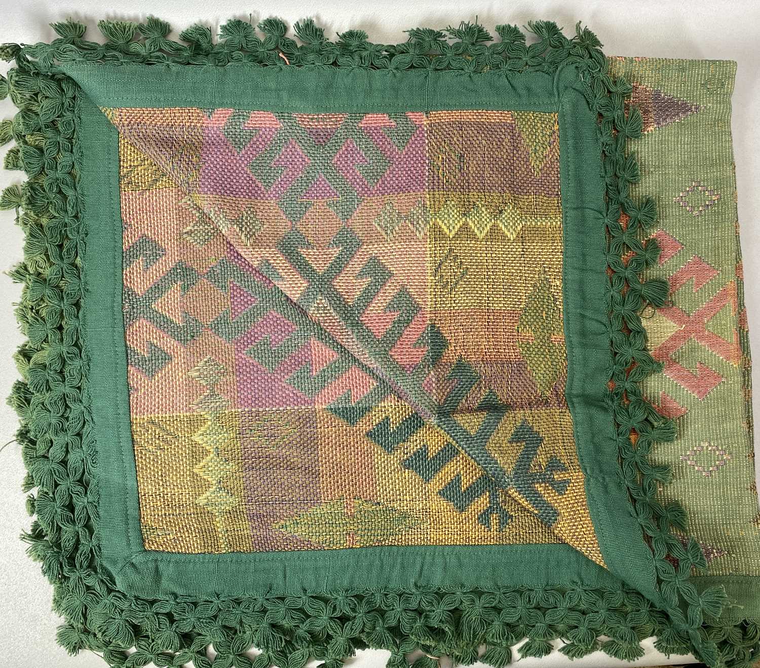 AN INDIAN COTTON TABLE COVER - geometric field in a kaleidoscope of colours with green fringed - Image 3 of 3