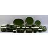 APILCO FRANCE - a set of tableware, green with gilt border including oval plates, circular plates,