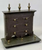 WELSH FOLK ART - a Victorian carved slate model of a chest of drawers with brass knobs and