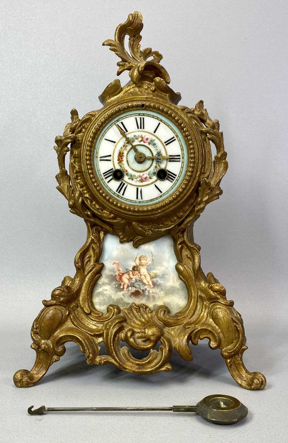 A FRENCH ROCOCO STYLE GILT PAINTED MANTEL CLOCK - late 19th century, circular porcelain dial hand - Image 2 of 5