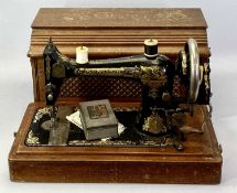 A SINGER HAND CRANK SEWING MACHINE - Serial No J641232, in mahogany case