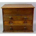 MAHOGANY TABLE TOP CHEST - with lift up lid, over three long drawers, turned knob handles, 40cms