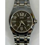 CITIZEN ECODRIVE WR100 WRISTWATCH - 38mm stainless steel case, black dial with Arabic and baton hour