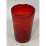 M POWELL FOR WHITEFRIARS - a red glass wave ribbed vase, 15.5cms H, 10cms diameter