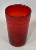 M POWELL FOR WHITEFRIARS - a red glass wave ribbed vase, 15.5cms H, 10cms diameter